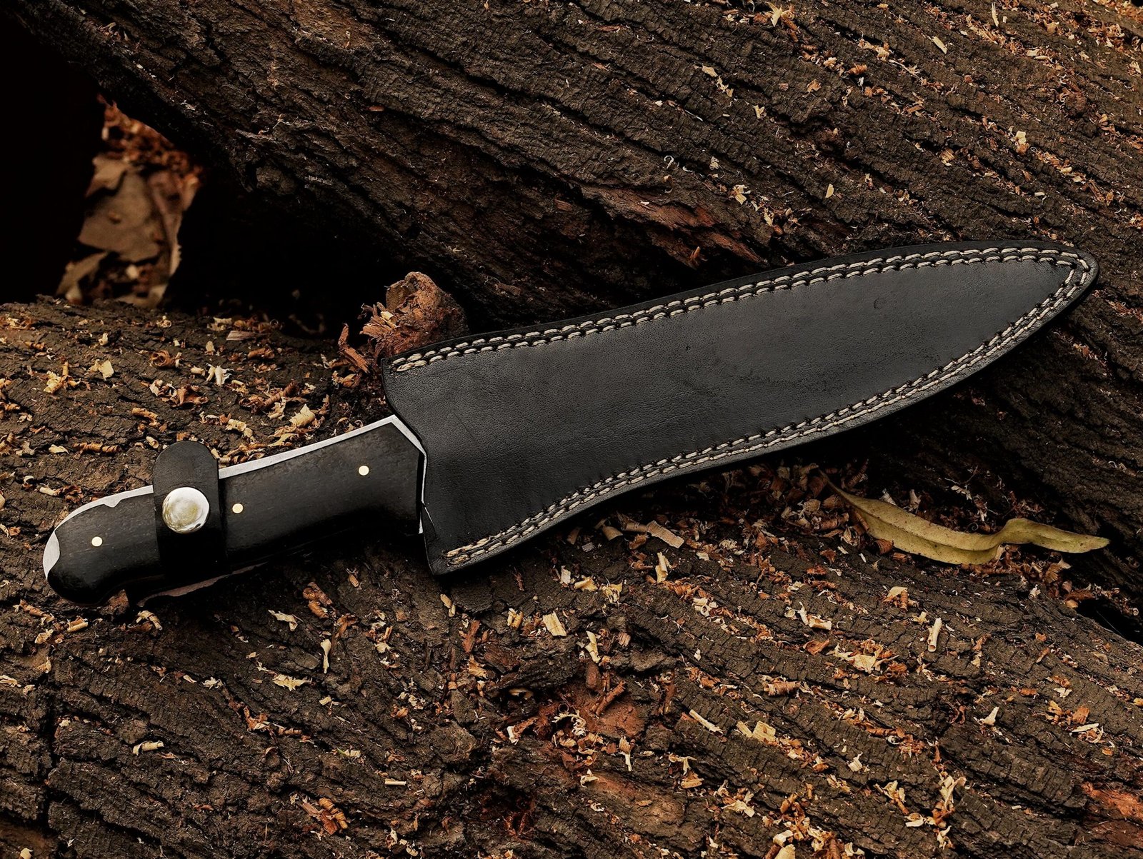 Jack Krauser fixed blade knife with leather sheath