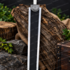 Full-length view of the Berserk Guts Dragon Slayer sword replica with black and silver dual-tone blade